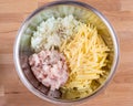 Onions, potatoes and minced meat in a bowl. Top view, ingredients for the pie Royalty Free Stock Photo