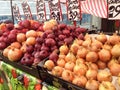 Onions for sale in a farmers market.