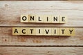 Online Activity word alphabet letters on wooden background