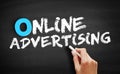 Online Advertising text on blackboard Royalty Free Stock Photo
