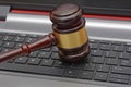 Online Auction wooden Gavel on computer keyboard
