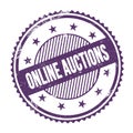 ONLINE AUCTIONS text written on purple indigo grungy round stamp