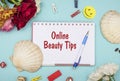 Online beauty tips banner with office stationery top view