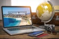 Online booking, travel destinations and tourism concept. Laptop, globe, passports, camera and other tourist accesoires