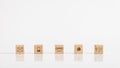 Online business communications concept of wooden cubes on white