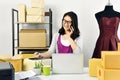 Online business, Young asian woman work at home for e-business commerce, Small business owner checking and packing online order.