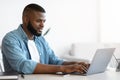 Online Career. Portrait Of Young Black Male Freelancer Typing On Laptop Royalty Free Stock Photo