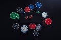 Online casino gambling concept. Smartphone blank screen on chips stack and playing dice over black table background. People Royalty Free Stock Photo