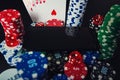 Online casino gambling concept. Smartphone blank screen on chips stack, royal flush poker cards combination and red dices and