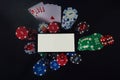 Online casino gambling concept. Smartphone blank screen on chips stack, royal flush poker cards combination and red dices over Royalty Free Stock Photo