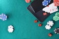 Online casino games with mobile devices on mat with objects Royalty Free Stock Photo