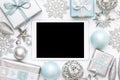 Online Christmas Shopping. Boxing Day Sale Background. Wrapped christmas presents, ornaments and blank screen digital tablet.