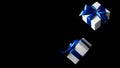 Online christmas. White gift box with blue ribbon isolated on black background in Black Friday concept. Decoration and copy space Royalty Free Stock Photo