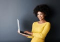 Online class, work and portrait of black woman with laptop, mockup and happiness in studio background. Computer