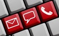 Online Contact icons on red keyboard Royalty Free Stock Photo