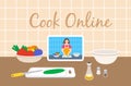 Cooking food with online culinary video tutorial