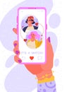Online dating app concept on phone screen. Female hand with smartphone.