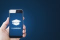 Online education, e-learning and e-book concept. Hand using mobile smart phone for online education Royalty Free Stock Photo
