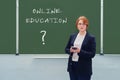 Online education with a question mark, problems with learning new technologies and the Internet, copy space. Concept of trouble Royalty Free Stock Photo