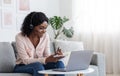 Online Education. Young Black Female Studying Online From Home With Laptop Computer