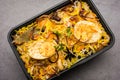 Online Food Delivery - Anda Pulao Or Egg Biryani packed in Plastic box Royalty Free Stock Photo