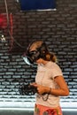 Online games in vr helmet in a computer club. Competitions in e-sports among youth Royalty Free Stock Photo