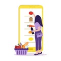 Online grocery store, shopping concept. Order food by Internet. Girl chooses products on the screen phone and puts in the basket