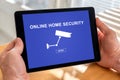 Online home security concept on a tablet Royalty Free Stock Photo