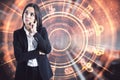 Online horoskop concept with pensive woman in black suit on digital wheel with zodiac sign background