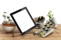 Online Japanese food delivery concept with sushi rolls on an electronic tablet and chopsticks 3d render