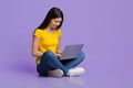 Online Jobs Concept. Young Smiling Korean Woman Sitting On Floor Using Laptop