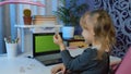 Online kids distance remote education, children e-learning lesson, child girl pupil doing homework