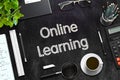 Online Learning Concept on Black Chalkboard. 3D Rendering. Royalty Free Stock Photo