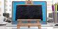 Online learning concept. Blackboard on laptop against blur office background, copy space Royalty Free Stock Photo