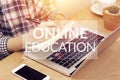 Online learning course concept. student using computer laptop for training online and writing lecture note in notebook