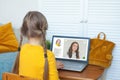 Online learning and education technology concept. Child girl studying online at home Royalty Free Stock Photo