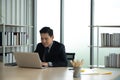 Online learning, Meeting, working and E learning concept. Casual Asian business man studying online course,meeting via computer Royalty Free Stock Photo