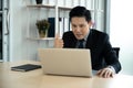 Online learning, Meeting, working and E learning concept. Casual Asian business man studying online course, meeting via computer. Royalty Free Stock Photo