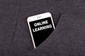 Online Learning. Smartphone in pocket. Technology business and communication, education background