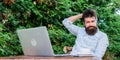 Online mass media worker. Write article for online magazine. Man looking for inspiration. Find topic write. Bearded Royalty Free Stock Photo