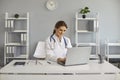 Online medical consultation. Doctor has video chat with a patient using a computer in the office clinic. Royalty Free Stock Photo