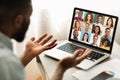 Online Meeting. Group Of Multiracial People Communicating Via Video Call On Laptop