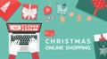 Christmas online shopping top view concept, santa Claus hand makes order on laptop and text