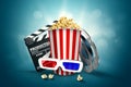 Online movies, cinemas, an image of popcorn, 3d glasses, a movie film and a blackboard on a blue background. The concept of a Royalty Free Stock Photo