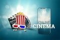 Online movies, cinemas, an image of popcorn, 3d glasses, a movie film and a blackboard on a blue background. The concept of a Royalty Free Stock Photo