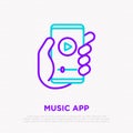 Online music thin line icon: smartphone with music app in hand. Modern vector illustration