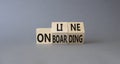 Online Onboarding symbol. Turned wooden cubes with words Online Onboarding. Beautiful grey background. Business and Online