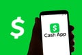 The online payment and banking app Cash App logo is seen on the screen of a mobile phone in Barcelona, Spain on July 06, 2022