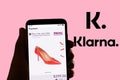 The online payment and banking app Klarna logo is seen on the screen of a mobile phone in Barcelona, Spain on July 06, 2022