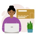 Online payment concept. Close up of a large credit card. A woman holding a laptop in his hand. Royalty Free Stock Photo